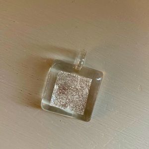 Glass necklace.